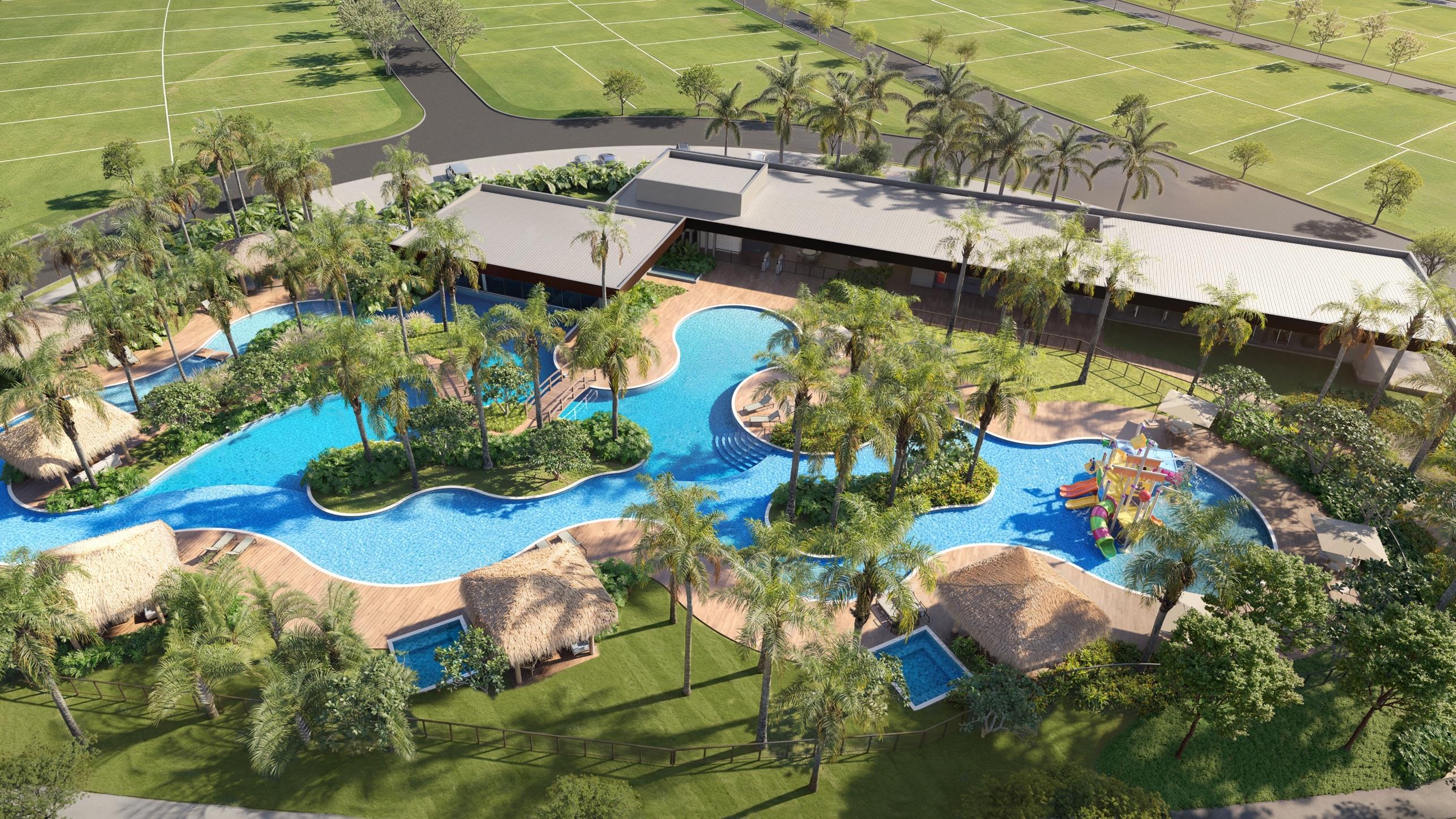 Vista aérea do clube com piscinas, bangalôs e áreas de lazer